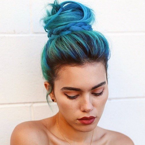 Magical Woman With Turquois Blue Hair In Top Knot Hairstyle