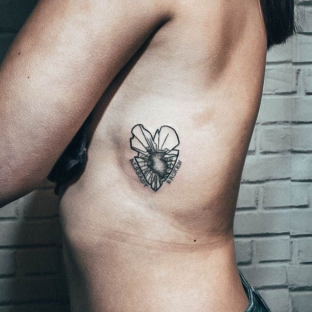 Magnificent Broken Heart Tattoo For Girls Ribs