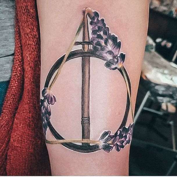 Magnificent Deathly Hallows Tattoo For Girls