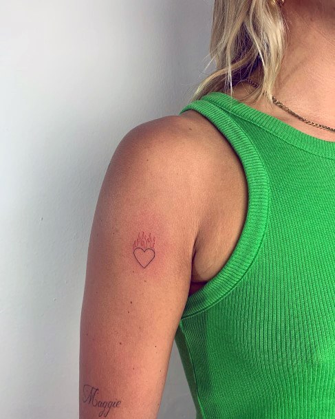 Magnificent Flaming Heart Tattoo For Girls