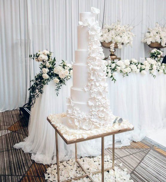 Magnificent Tall White Cake Flower Pedal Wedding Table Ideas