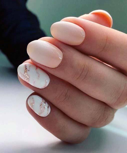 Marble Pattern On Beautiful Nude Shaded Nails On Female