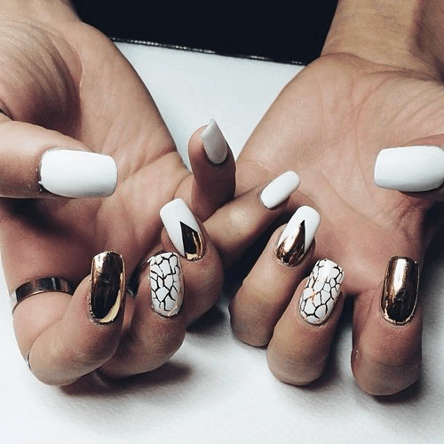 Marbled Gold And White Nail Design
