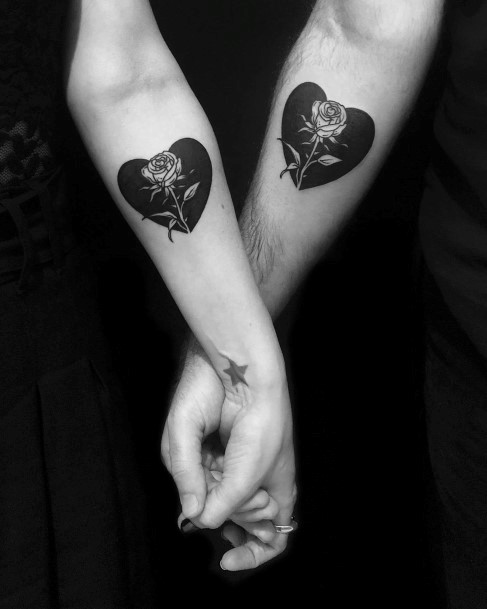 Matching Black Heart And Rose Tattoo Womens Forearms