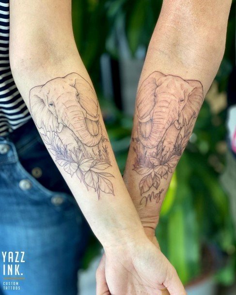 Matching Elephant Tattoo Forearms