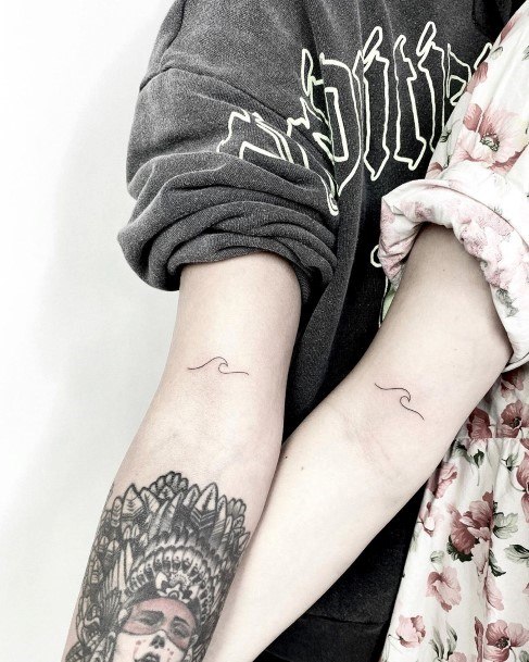 Matching Squiggly Tattoo Womend Forearms