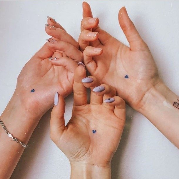 Matching Tiny Heart Tattoo Womens Hands