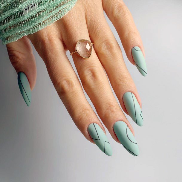 Matte Light Green Colored Nails With Black Lines