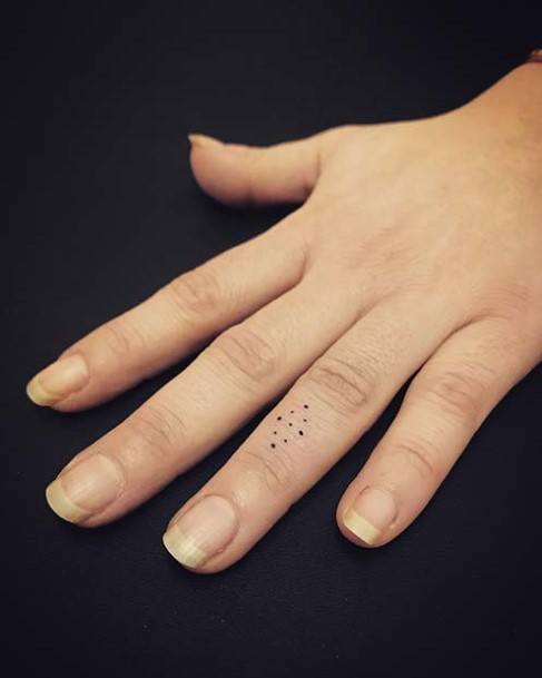 Measured Dots Womens Finger Tattoo