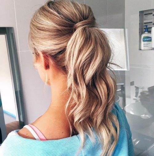 Medium Blonde Female With High Thick Ponytail And Hair Wrap