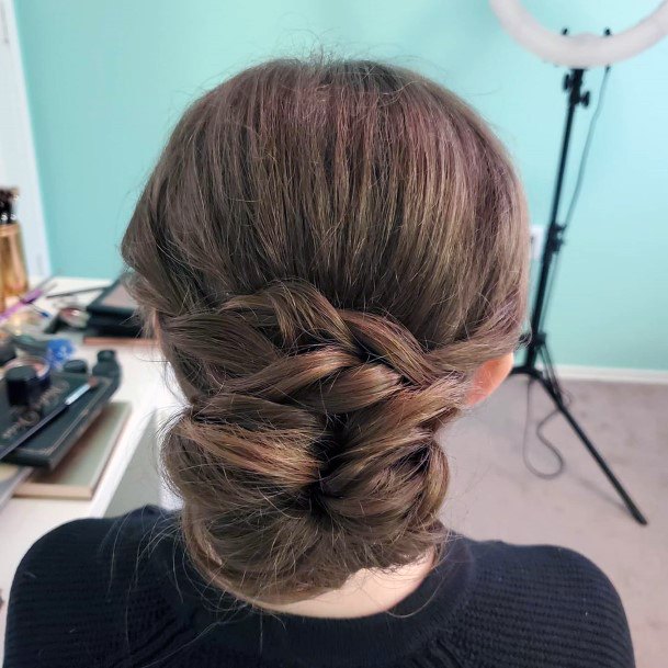 Medium Brown Hair With Loose Braid Into Low Bun