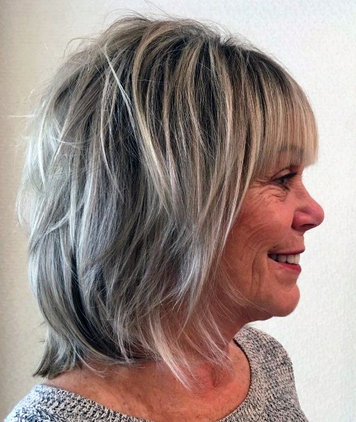 Medium Length Hairstyles For Women Over 50 Messy Shag With Bangs