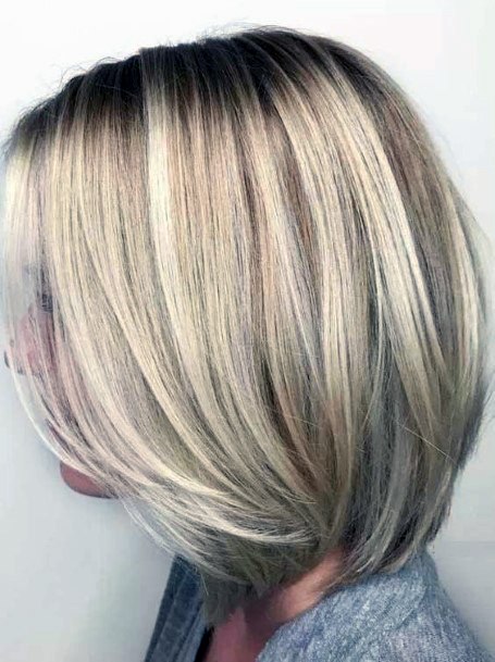 Medium Length Hairstyles For Women Over 50 Sleek Smooth Bob Cut