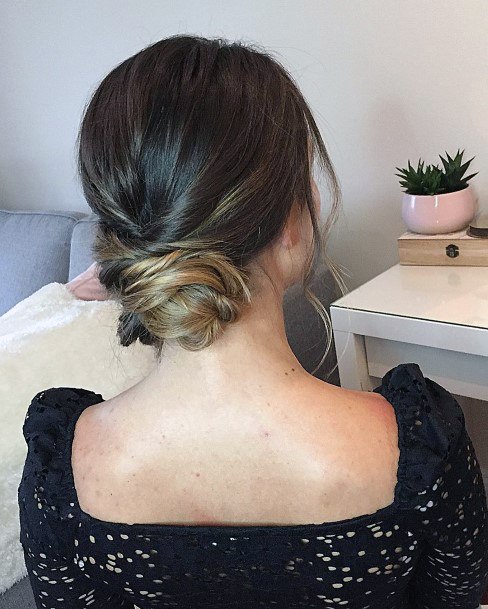 Medium To Light Brown Hair With Low Bun And Tendrils