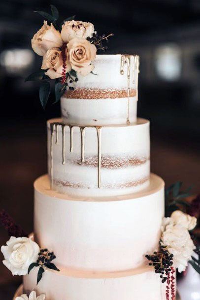 Melting Rose Gold Icing On Elegant White Cake Wedding Decor