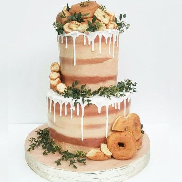 Melting White Icing Wedding Cake And Donut