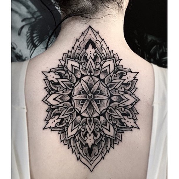 Memerizing Black Tattoo Womens Back