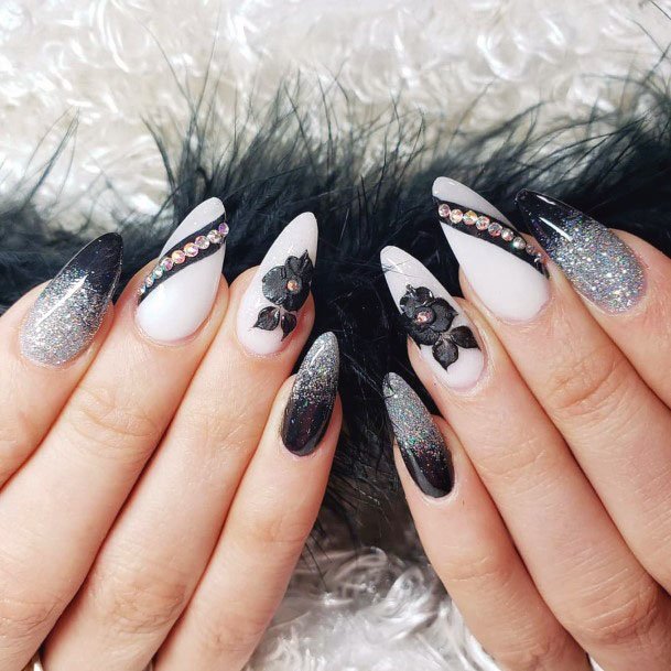 Mesmerizing Black Blossoms And Silver Jewels On Nails Women