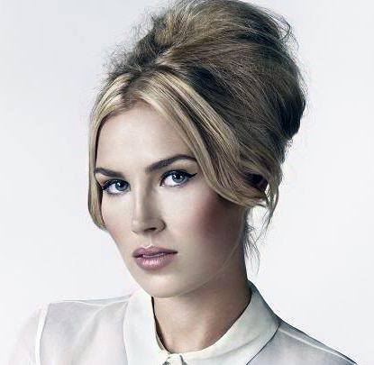 Messy Unkept Blonde Beehive Hairstyle With Long Bangs For Women