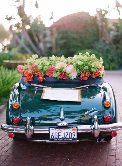 Metallic Wedding Car With Floral Decoration