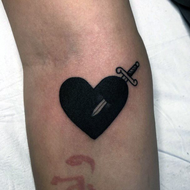 Minimal Dagger Heart Tattoo For Women