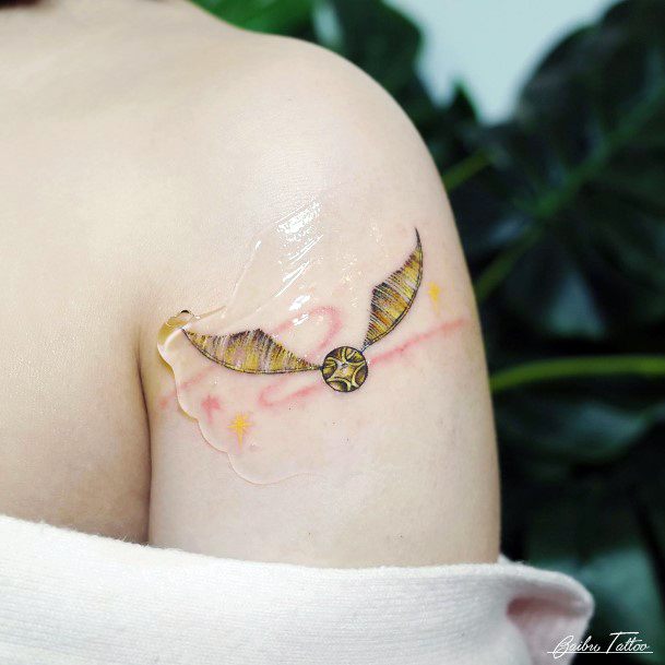 Minimal Golden Snitch Tattoo For Women