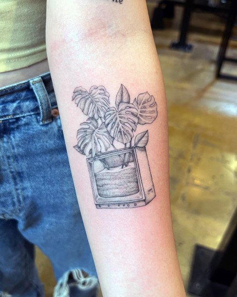 Monstera Female Tattoo Designs