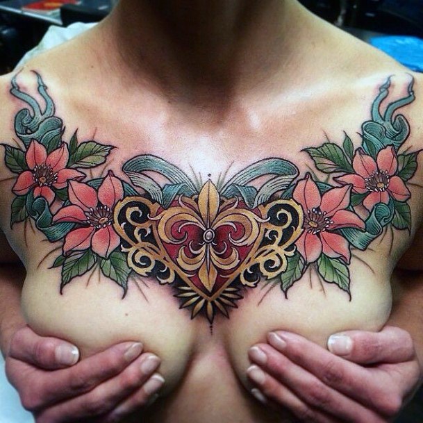 Monumental Womens Tattoo On Chest