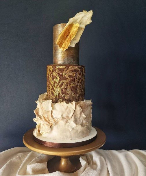 Most Yum Chocolate Wedding Cake With Golden Design