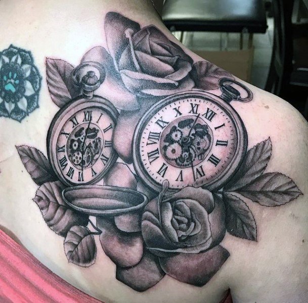 Multiple Roses And Clocks Tattoo Womens Back