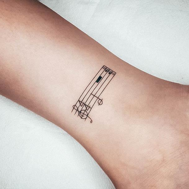 Music Note Tattoo Feminine Designs