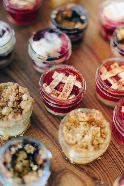 Mutiple Desserts In Mason Jar Wedding Decorations