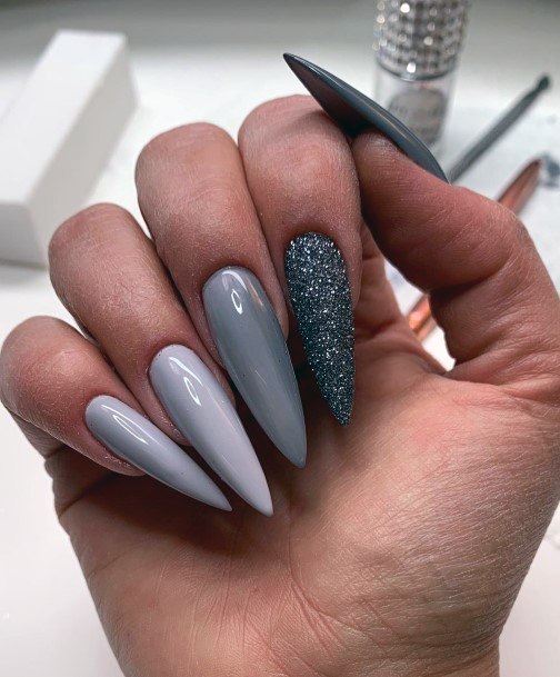 Nails Colored In Dusty Grey Tones