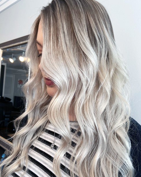 Natural Dark Rooted Wavy Platinum Blonde Defined Ombre Womens Hairstyle