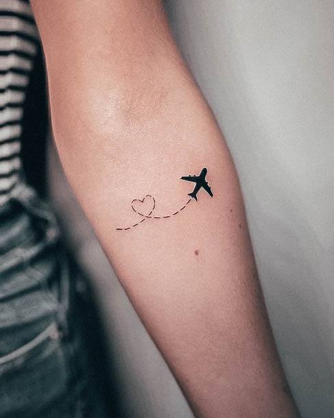 Neat Airplane Tattoo On Female