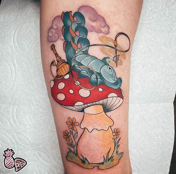 Neat Alice In Wonderland Tattoo On Female