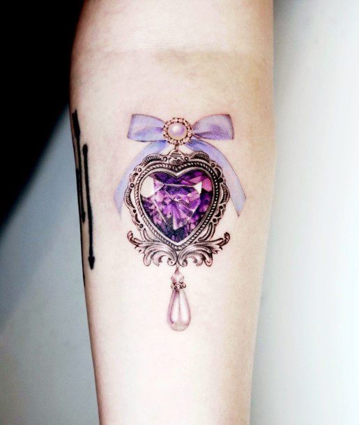 Neat Amethyst Tattoo On Female