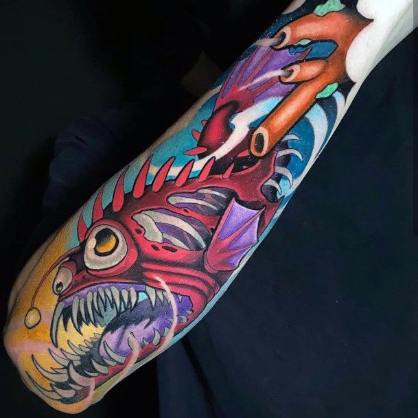 Neat Anglerfish Tattoo On Female