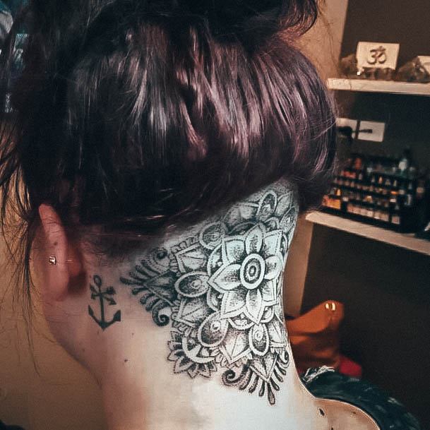 Neat Back Of Neck Tattoo On Female