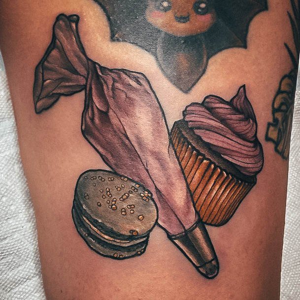 Neat Baking Tattoo On Female