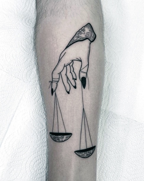 Neat Balance Tattoo On Female