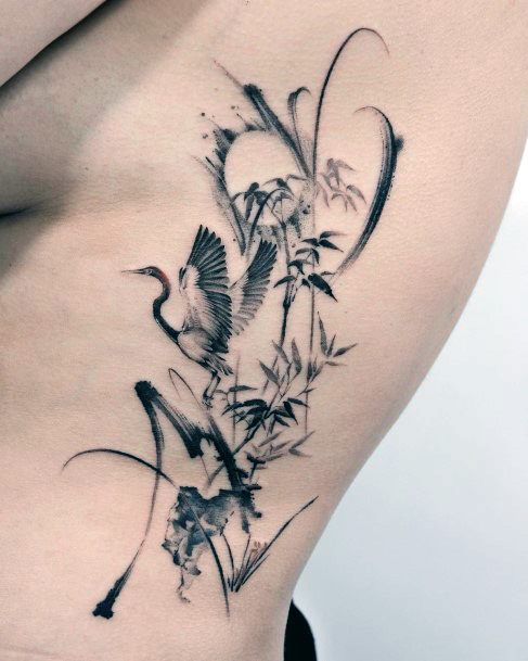 Neat Bamboo Tattoo On Female