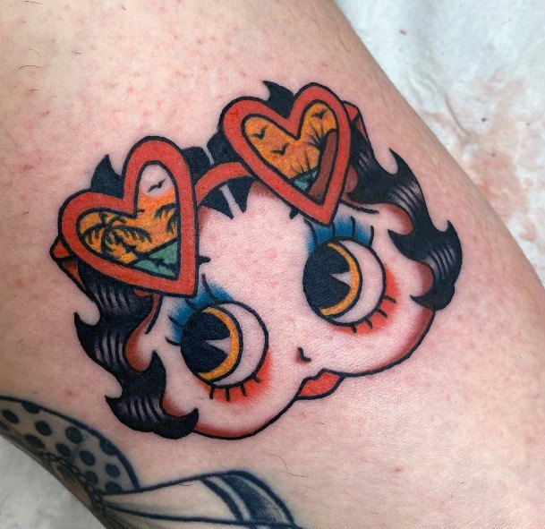 Neat Betty Bop Tattoo On Female