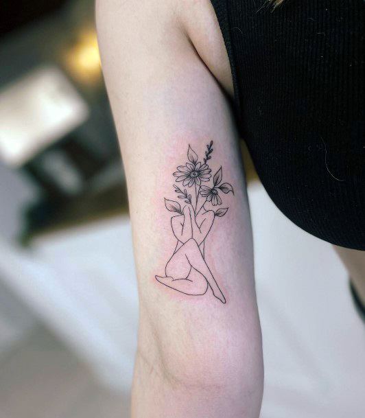 Neat Bicep Tattoo On Female