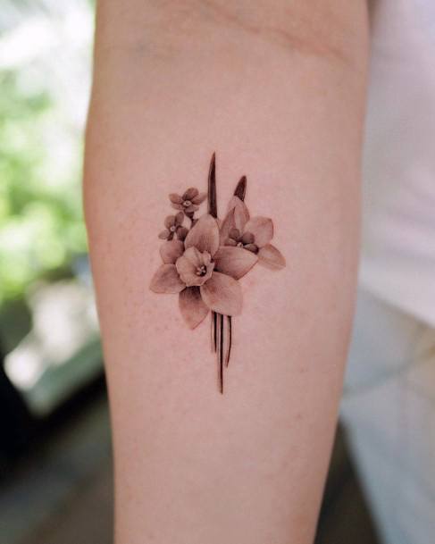 Neat Bouquet Tattoo On Female