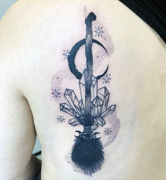 Neat Broomstick Tattoo On Female