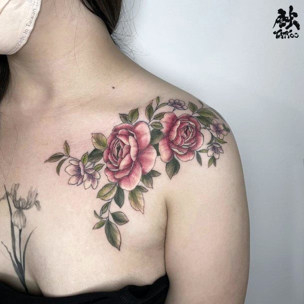 Neat Camellia Tattoo On Female