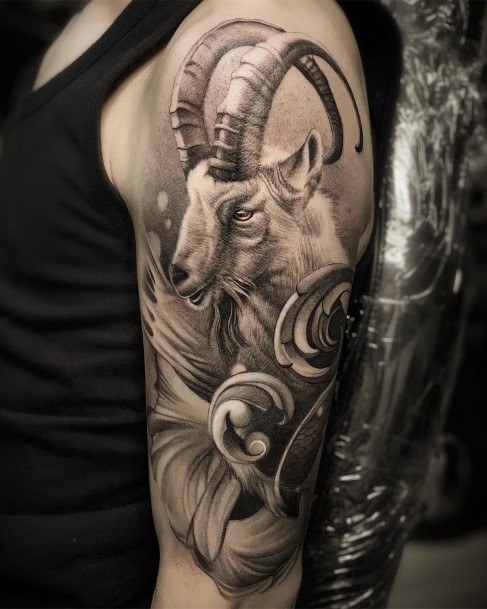 Neat Capricorn Tattoo On Female