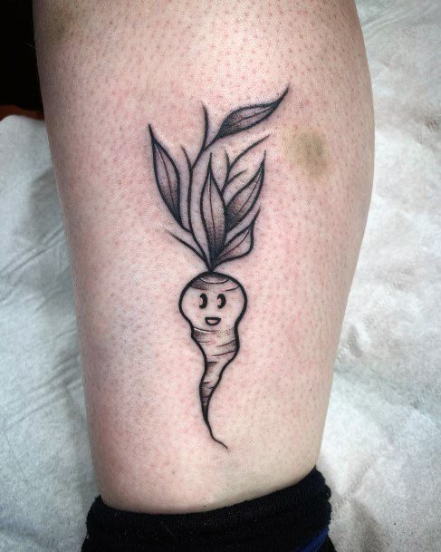 Neat Carrot Tattoo On Female