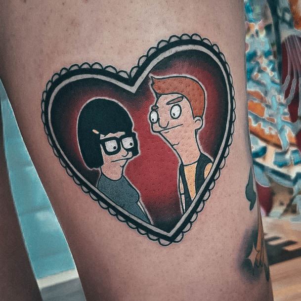 Neat Cartoon Tattoo On Female